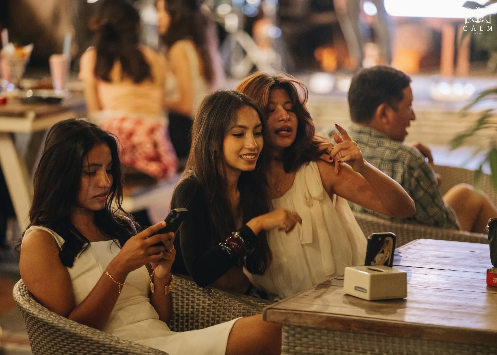 Friends gathering at Calm